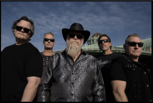 NJ Hard Rock Warriors ‘Who On Earth’ Drop Powerful ‘DAWGZ’ Video – Airing on MTV’s Metal Thrashing Madness