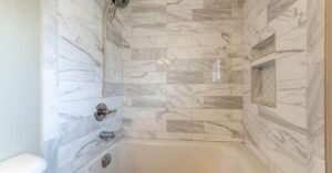 Big Easy Bathrooms Publishes Maintenance Guide Covering Cleaning Techniques, Material Identification, and Preventative Care for Bathtub Wall Surrounds