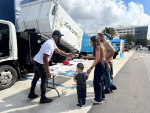 JUNK.COM EXTENDS ITS SERVICE BEYOND THE CURB AT THE WOODLANDS TOUCH-A-TRUCK